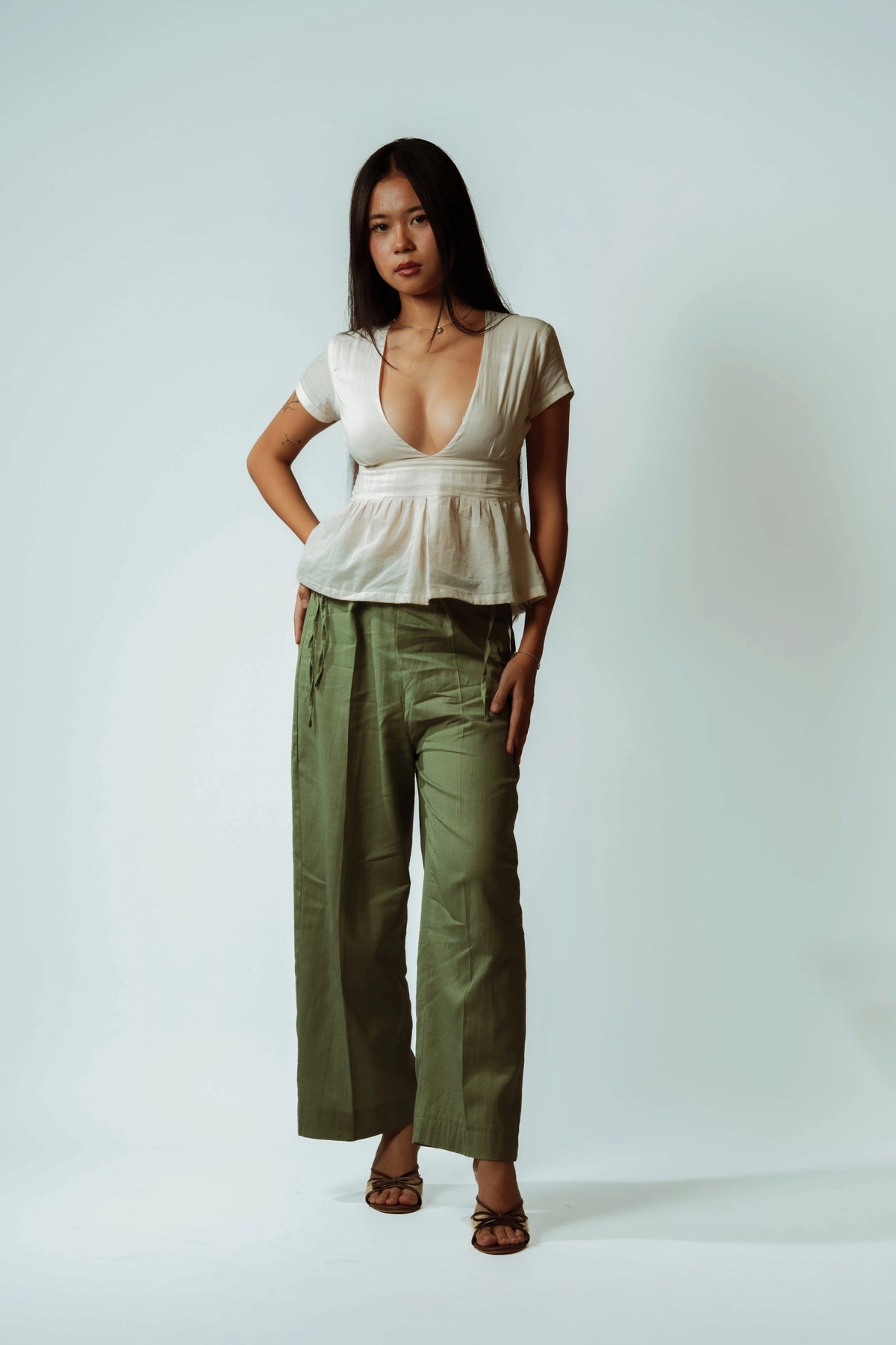 Pearl V-Neck Peplum Top